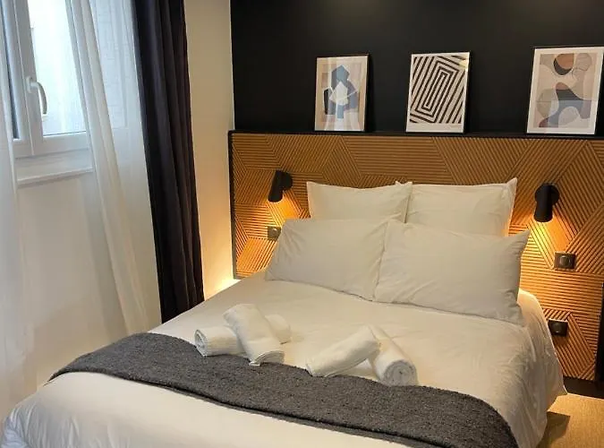 Апартаменты Le Palais Du Commerce